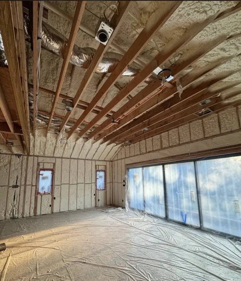 Interior walls and ceiling insulated with spray foam during new construction in Brandon